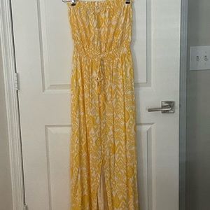 Bright, yellow, sleeveless, maxi dress.